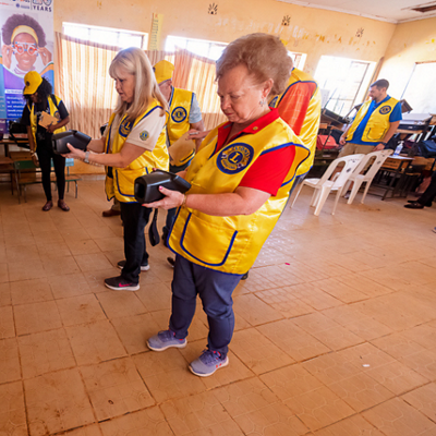 Dr. Cordes looking at a child for an eye exam