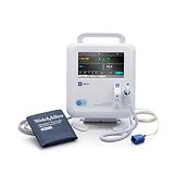 A Spot Vital Signs® 4400 Device with pulse oximeter, digital thermometer and blood pressure cuff attachments.