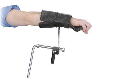 Surgical arm holder with patient hand in place