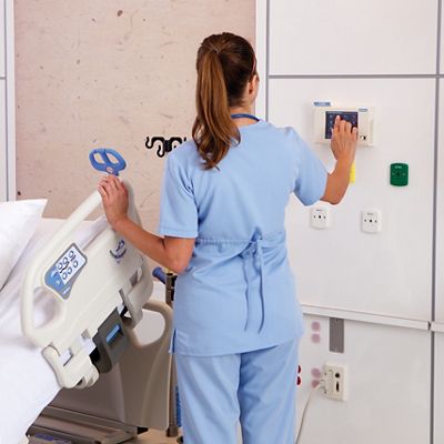 Caregiver using the NaviCare Nurse Call