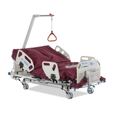 Excel Care ES Bariatric Hospital Bed, 3/4 view, head of bed raised with trapeze