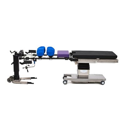 Hillrom surgical table equipped with Universal Spine Frame accessories.