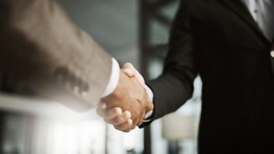 Business men shaking hands