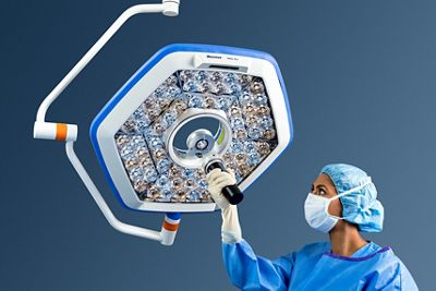 Clinician attaches camera to Helux Pro surgical light