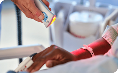 nurse scanning patients wrist