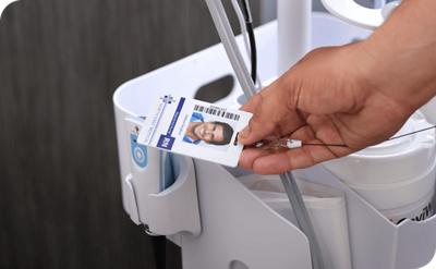 physician scanning badge against Connex 360 barcode scanner
