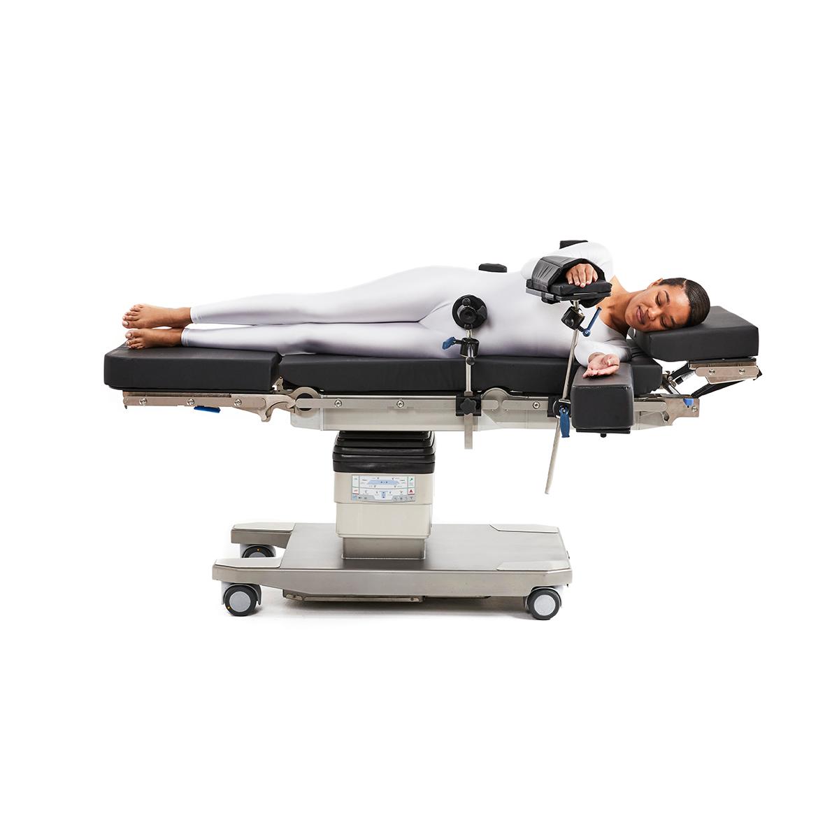 Patient positioned on Hillrom™ surgical table equipped with Lateral Positioning accessories. 