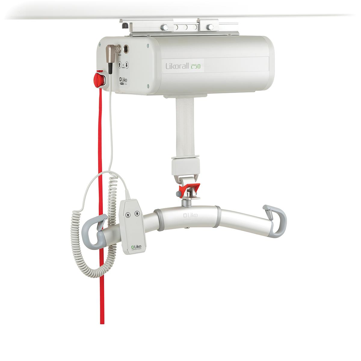 A posterior view of the Hillrom LikoGuard XL overhead patient lift. The unit's handheld control plugs into a port at left.