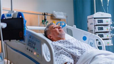 A med-surg patient lies in a Hillrom Centrella Smart+ Bed