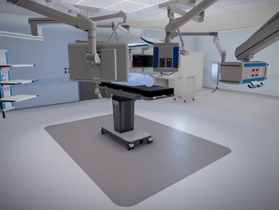 A digital render of a cardiovascular operating room with a patient on a surgical table