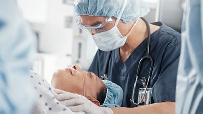 Nurse over patient