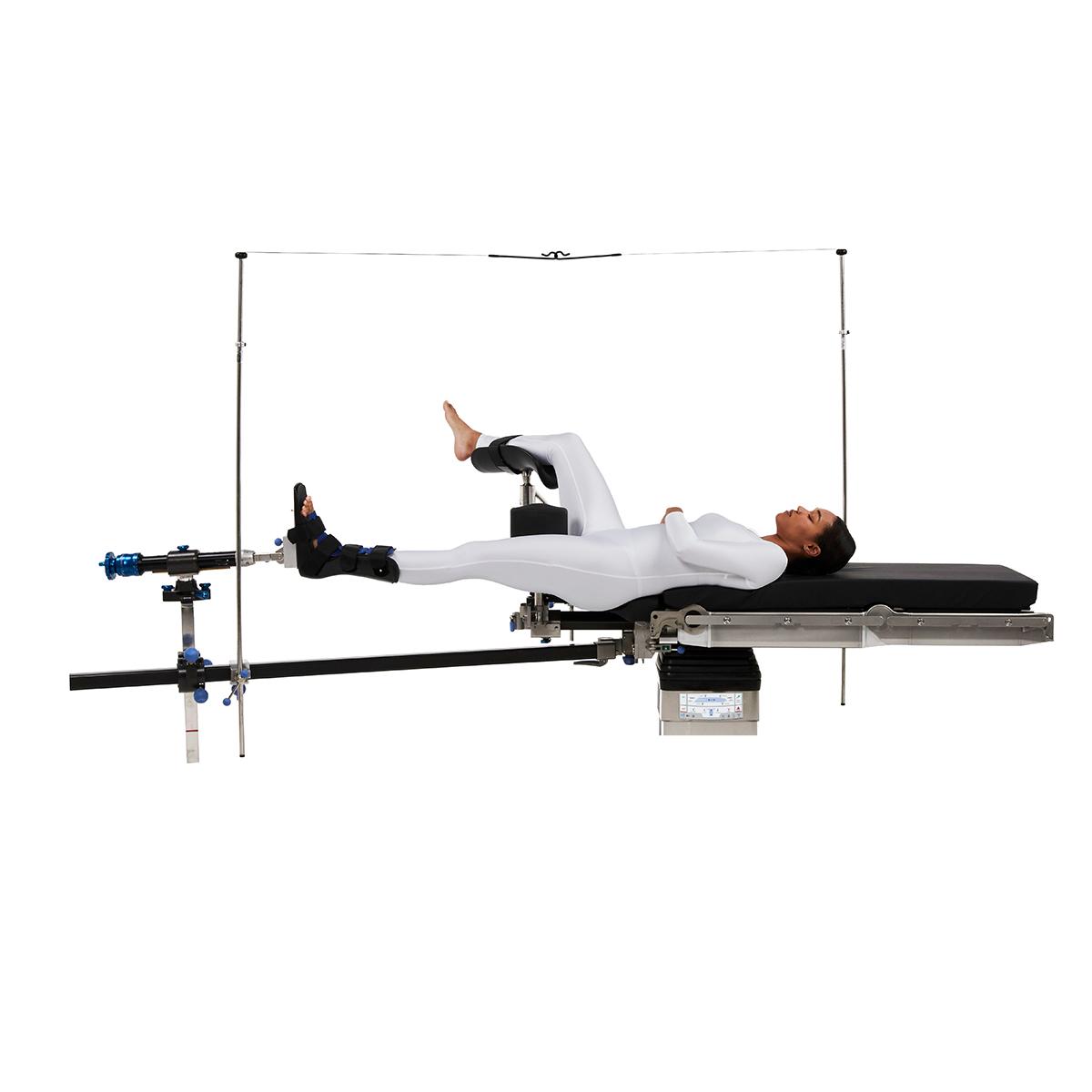 Patient positioned on a Hillrom surgical table using orthopedic extension accessories.