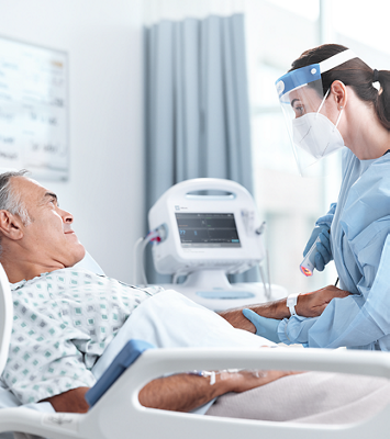 Nurse scanning patient