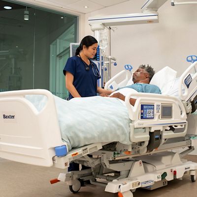 patient in hospital bed icu