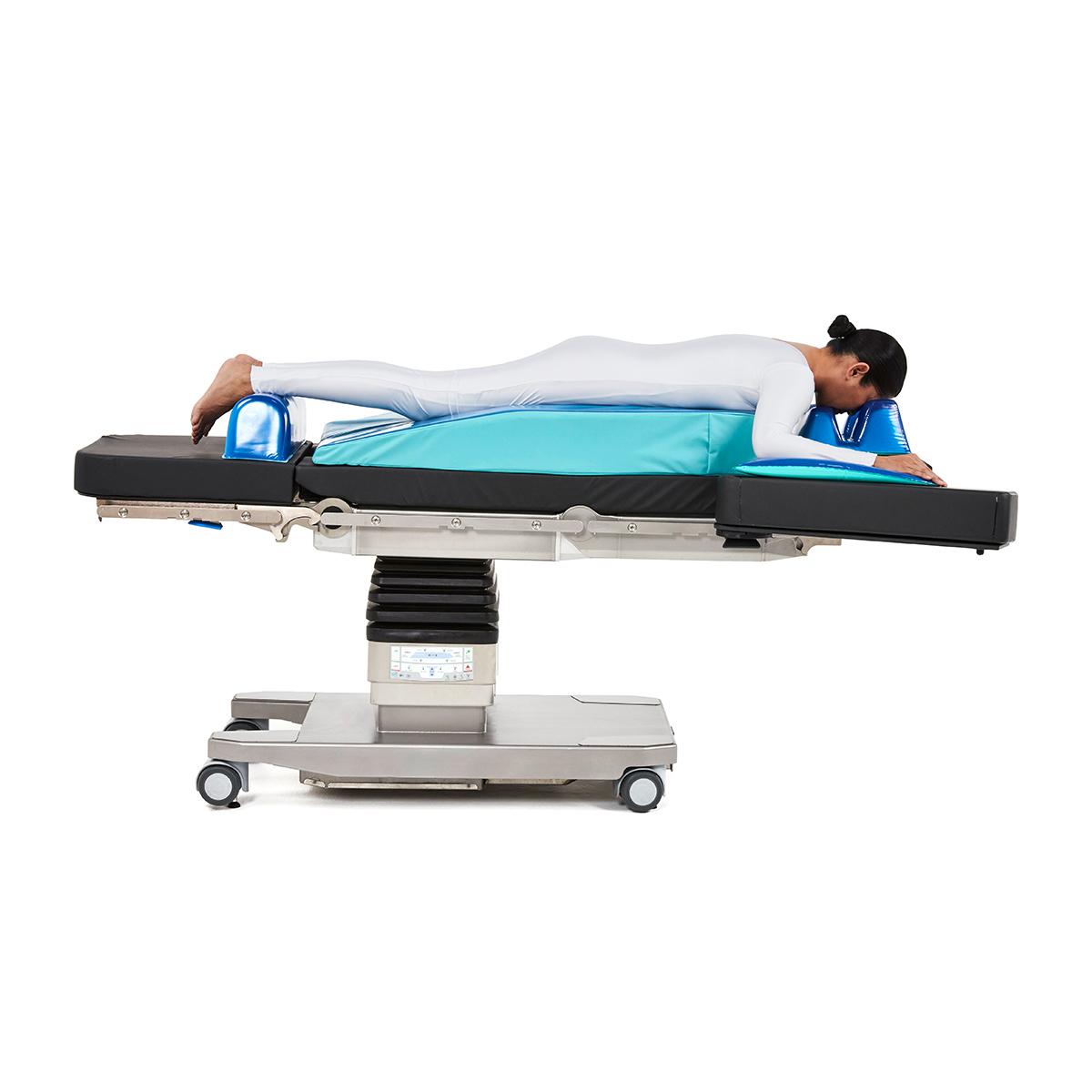 Patient positioned on Hillrom surgical table equipped with Gel Positioners accessories. 
