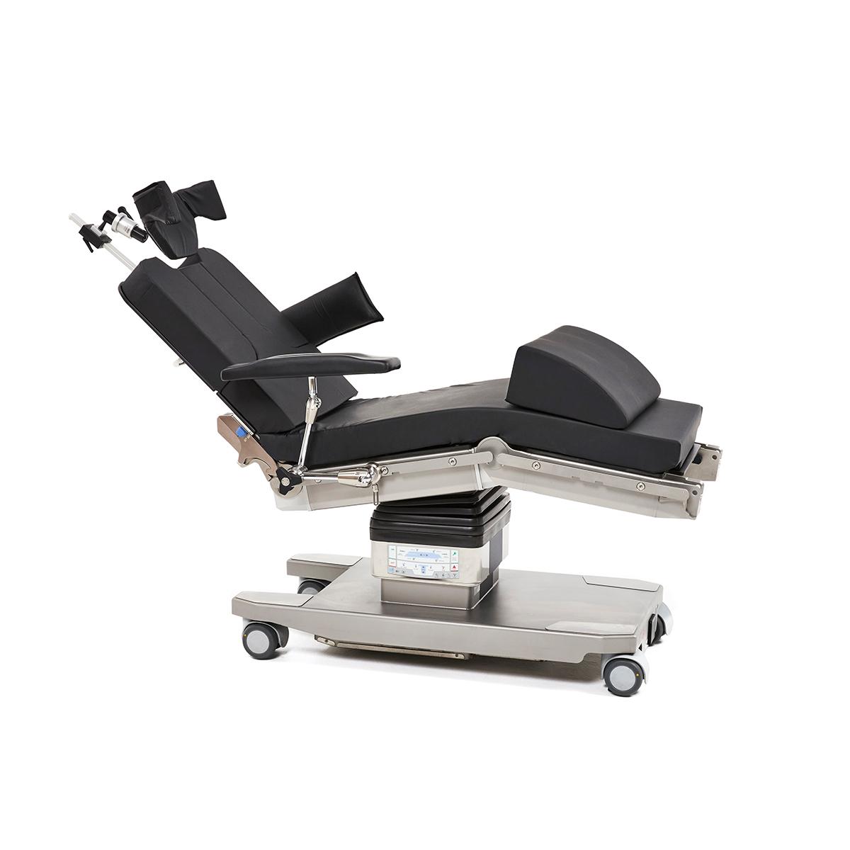 Hillrom shoulder chair surgical table equipped with accessories for positioning patients.