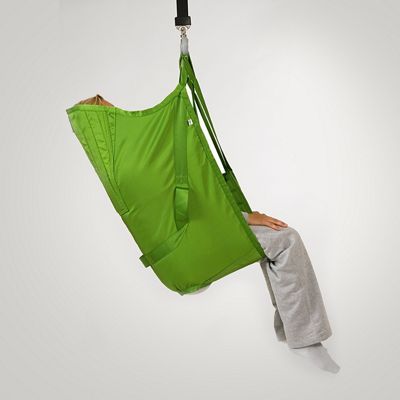 A patient sits in a soft Hillrom highback sling