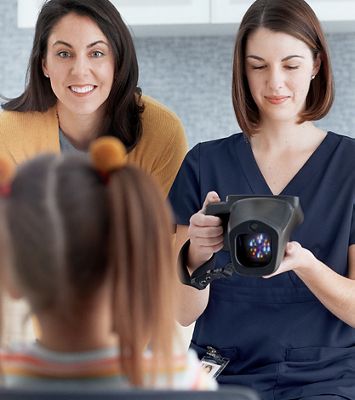 Mother and caregiver with child