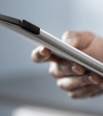 Caregiver using a mobile device.
