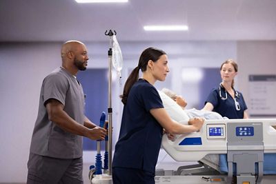 Dynamo hospital stretcher with medical staff