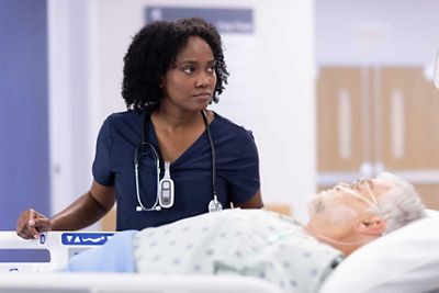 Dynamo hospital stretcher with medical staff