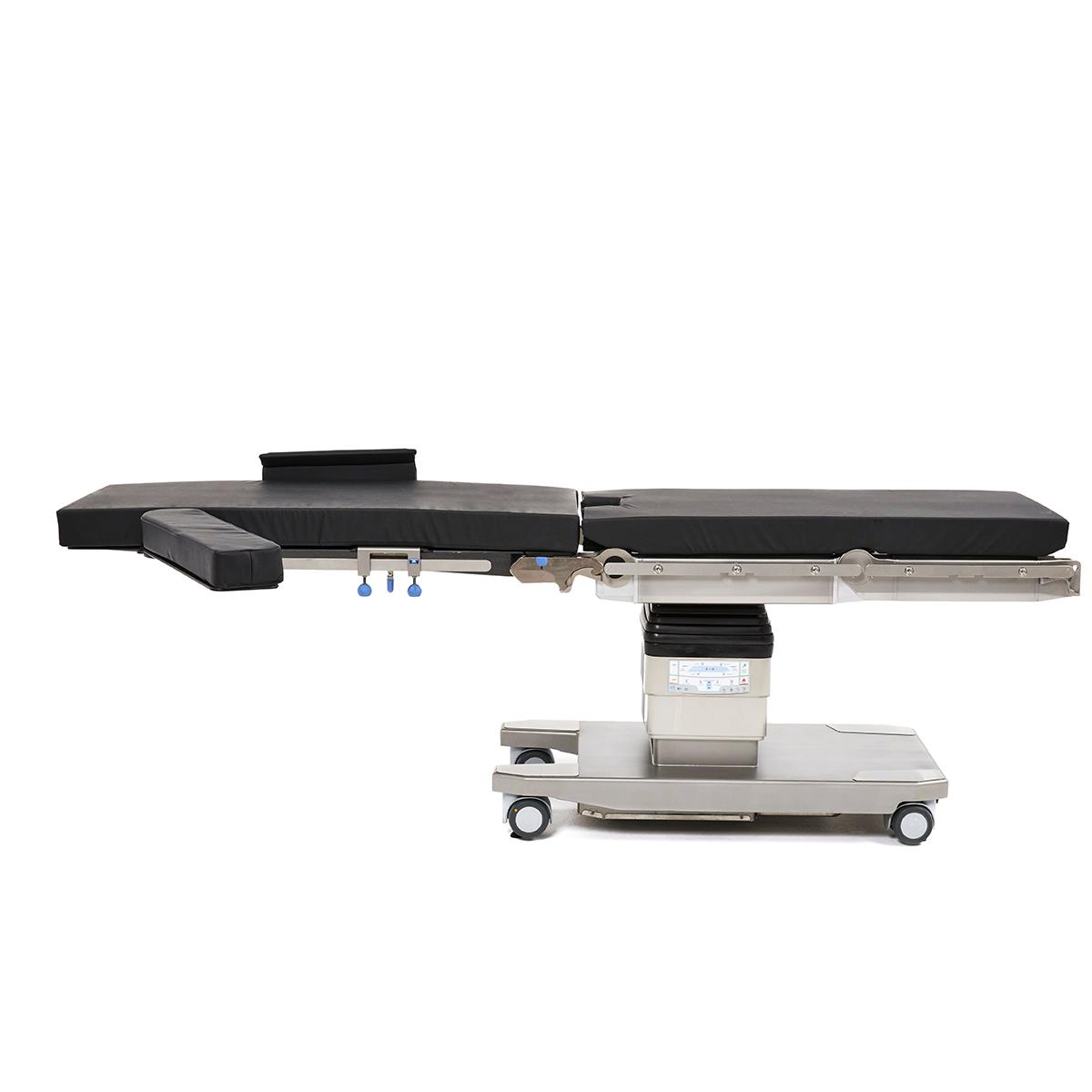 Hillrom surgical table equipped with vascular accessories for positioning patients.