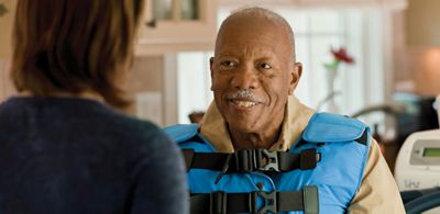 Patient wearing vest gettting treatment