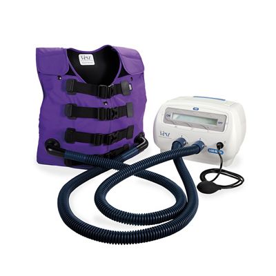 The Vest, Model 105, is shown in purple, connected with air hoses to the control unit