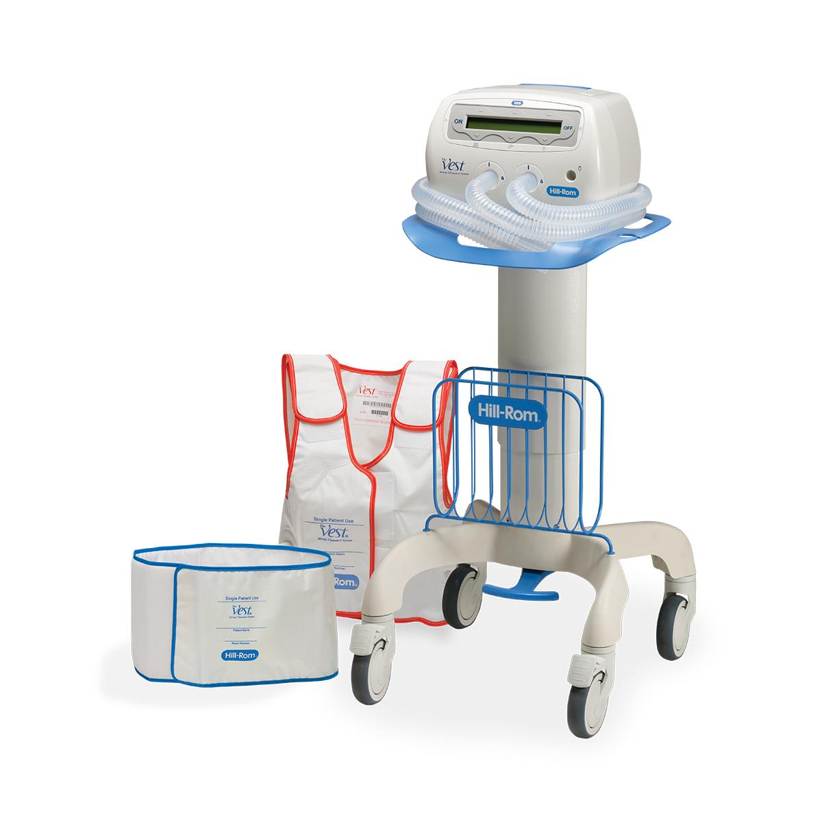 System The Vest, model 205, jednostka sterująca na stojaku wraz z kamizelką przeznaczoną do użytku u jednego pacjenta i chustą widocznymi w pobliżu