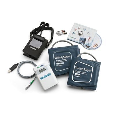 ABPM 7100 Ambulatory Blood Pressure Monitor and accessories on white background, overhead shot