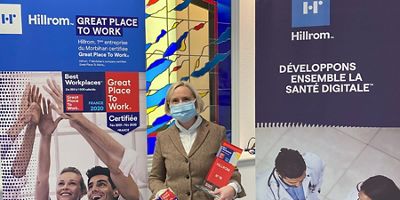 A Hillrom representative from Pluvigner, France, holds the “Great Place to Work” award