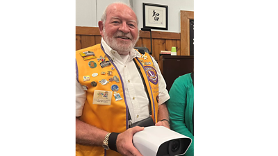 Lion Douglas Russell, Secretary, Syracuse Host Lions