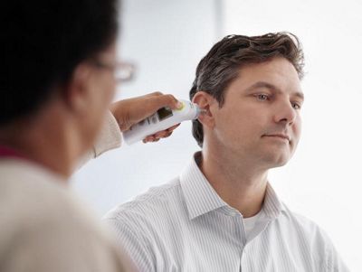 Braun ThermoScan PRO 6000 Ear Thermometer being used during an ear exam