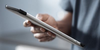 Caregiver using a mobile device.