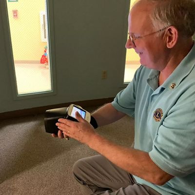 a man performs a vision screening