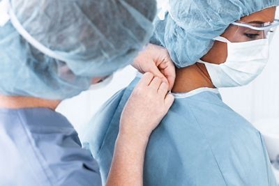 Nurse fastening gown