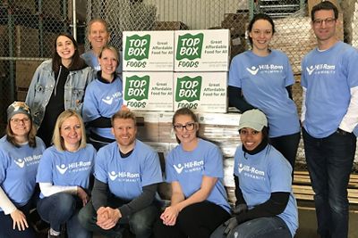 A group of Hillrom employees gather at a charitable event