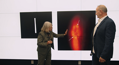 Dr. Kathleen Digre and Dr. Eric Eggenberger looking at ophthalmoscopy images