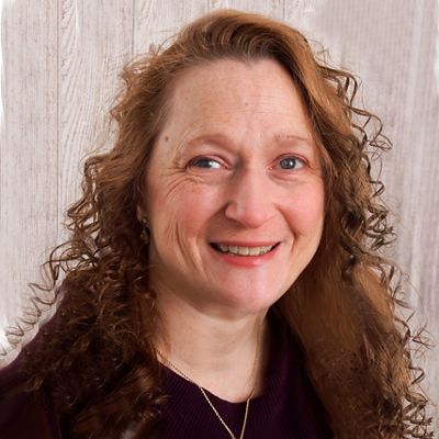 Monica Johnson is shown smiling