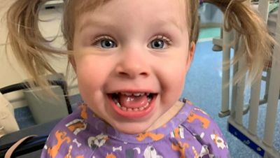 picture of a toddler with pigtails