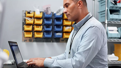 Medical personnel using laptop