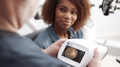 Patient receiving diabetic retinal exam