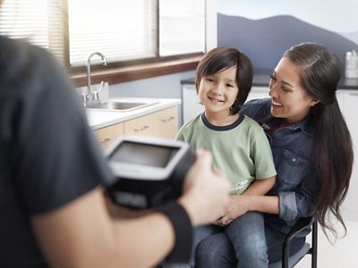 Male child on parent’s lap