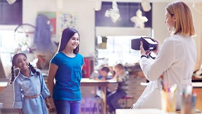 school nurse conducting eye exams on school children