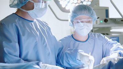 Doctors performing surgery